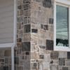 Close up exterior with custom blend of Wyndemere and Malheur real thin stone veneer