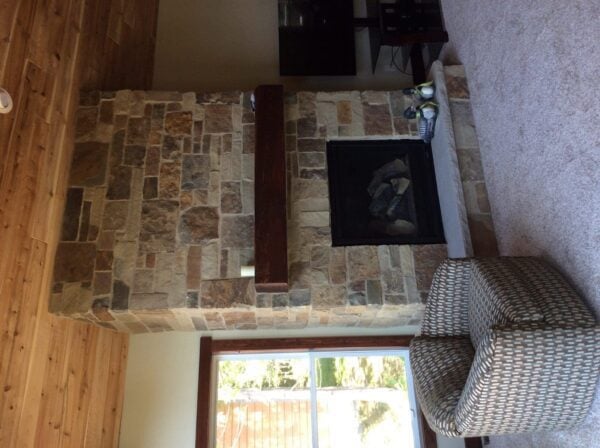 Interior gas fireplace with Cortez real thin stone veneer surround