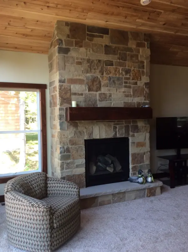 Interior gas fireplace with Cortez real thin stone veneer surround
