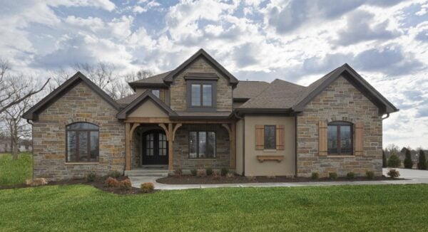 Custom Buckingham Natural Stone Veneer Exterior with Brown