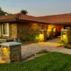 Cabernet Natural Thin Stone Veneer Home Exterior at Twilight