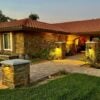 Cabernet Natural Thin Stone Veneer Home Exterior at Twilight