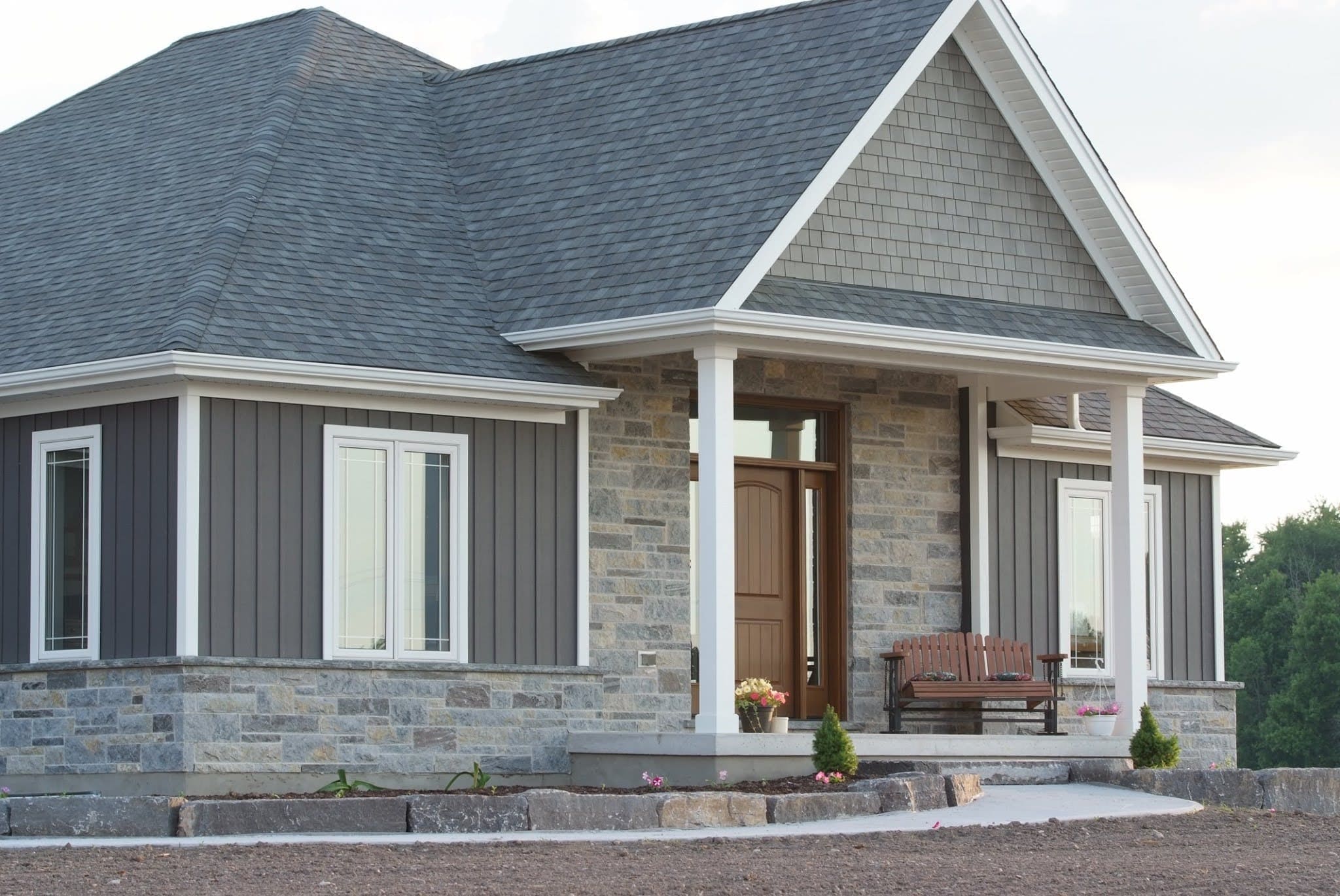 Jacksonport and Pembroke Real Stone Veneer Blend with White Mortar Exterior