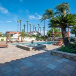 Outdoor Living Pool and Spa with Cabernet Natural Stone Veneer