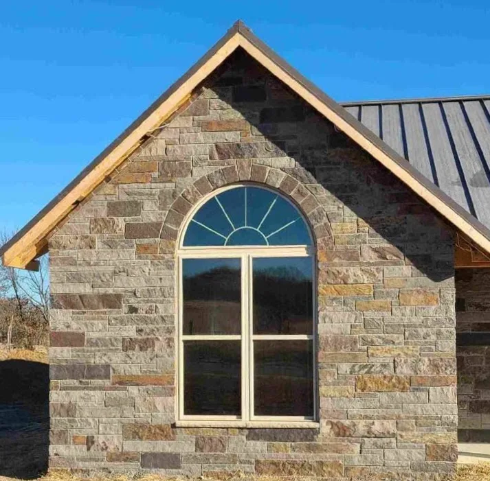 Custom Buckingham Real Stone Veneer with Brown Exterior