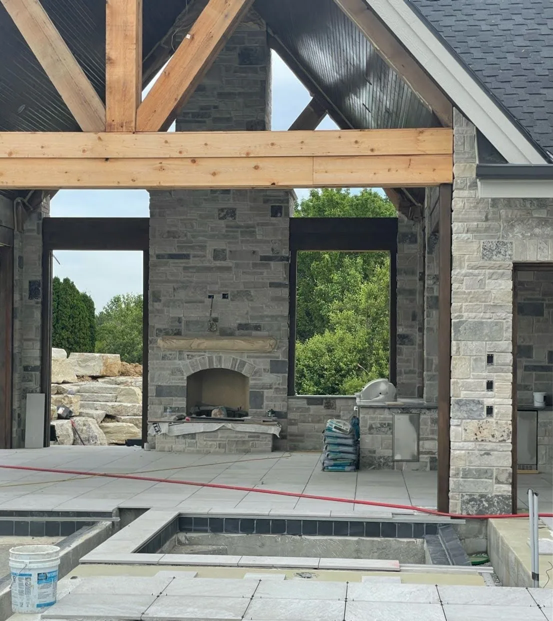 Graphite Ashlar Natural Stone Veneer Covered Patio