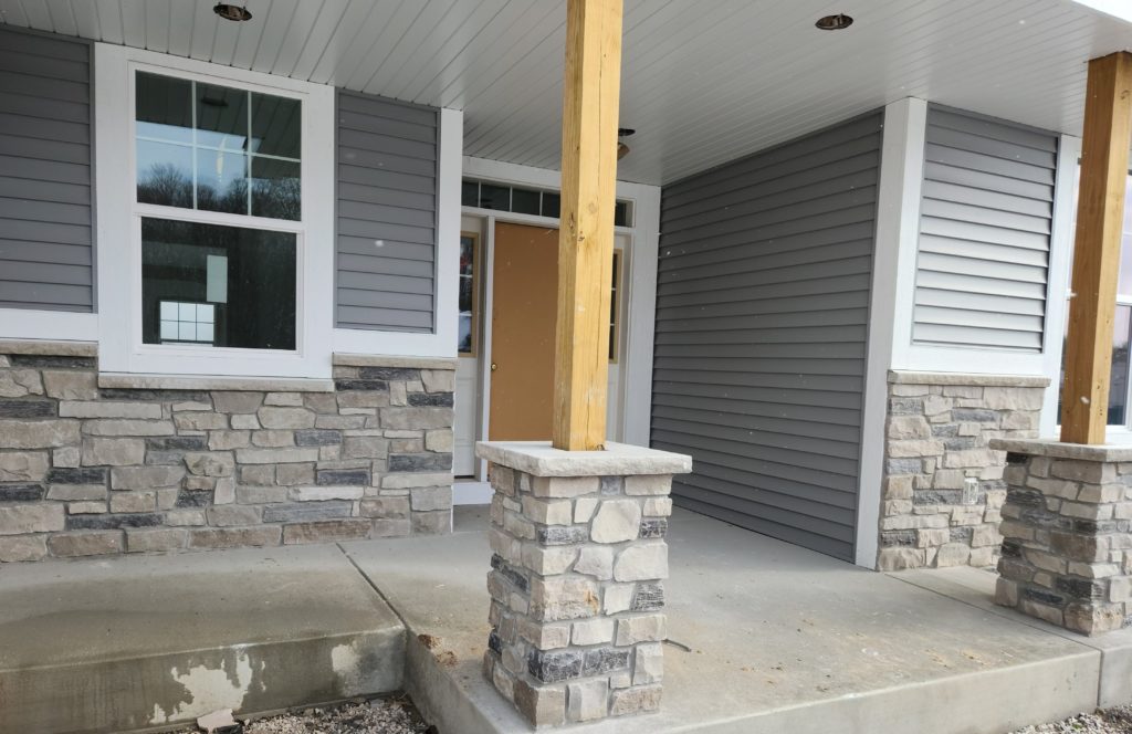 Custom Thunder Bay with Smaller Heights Real Stone Veneer Entrance