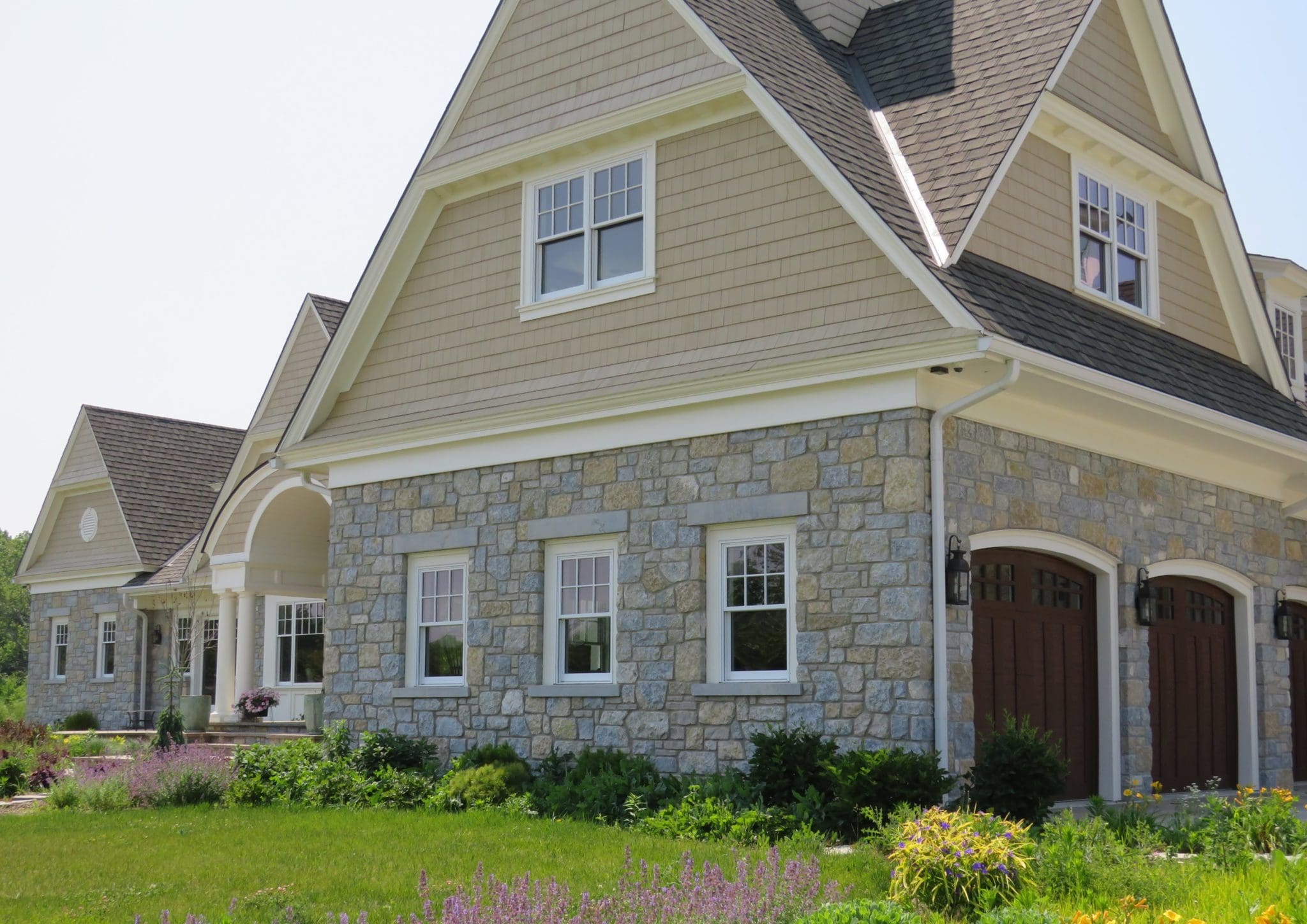 Chateau and Nottingham Tumbled Limestone Natural Thin Veneer Exterior