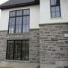 Pembroke Natural Stone Veneer Installation with Light Mortar Flush Joint