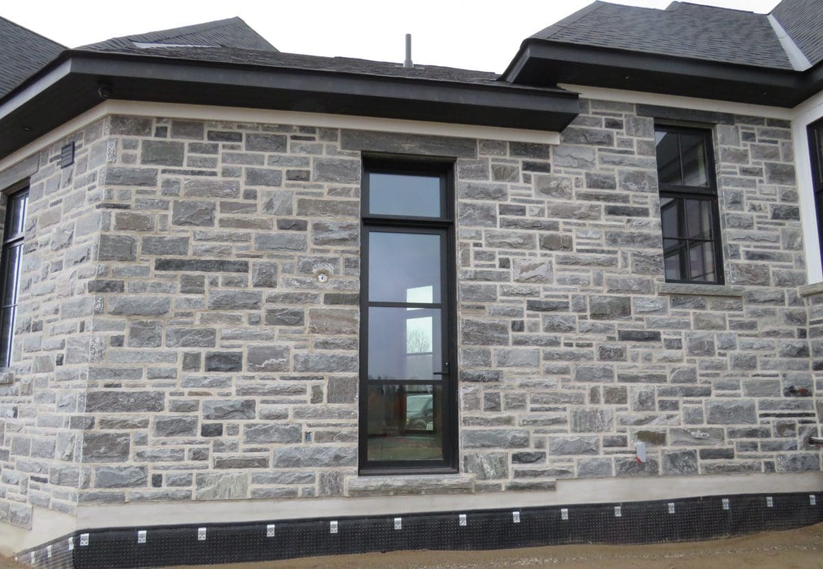 Pembroke Granite Thin Veneer Exterior With Light Mortar Flush Joint Quarry Mill 6398