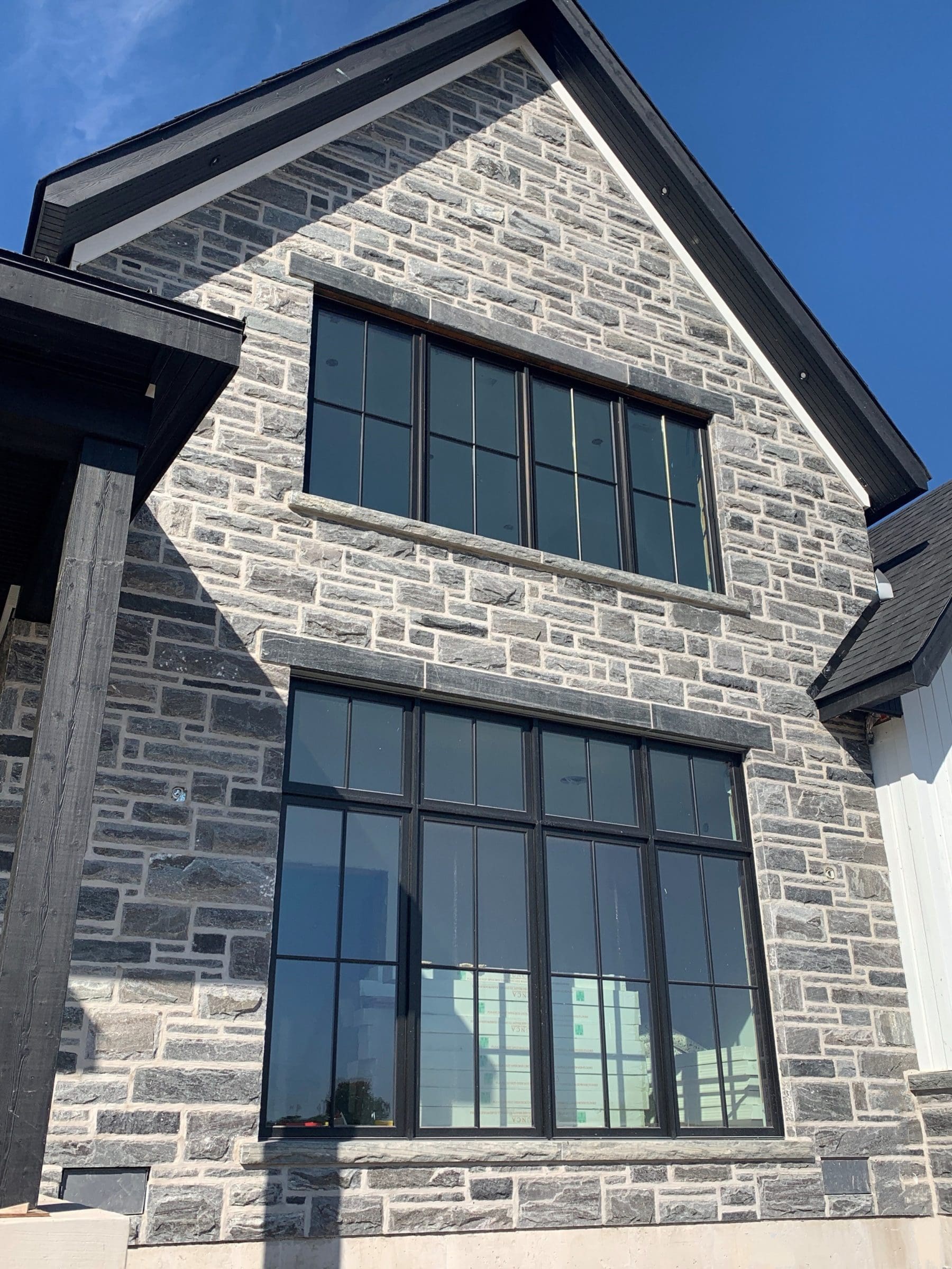 Pembroke Granite Thin Veneer Exterior With Light Mortar Flush Joint Quarry Mill 9008