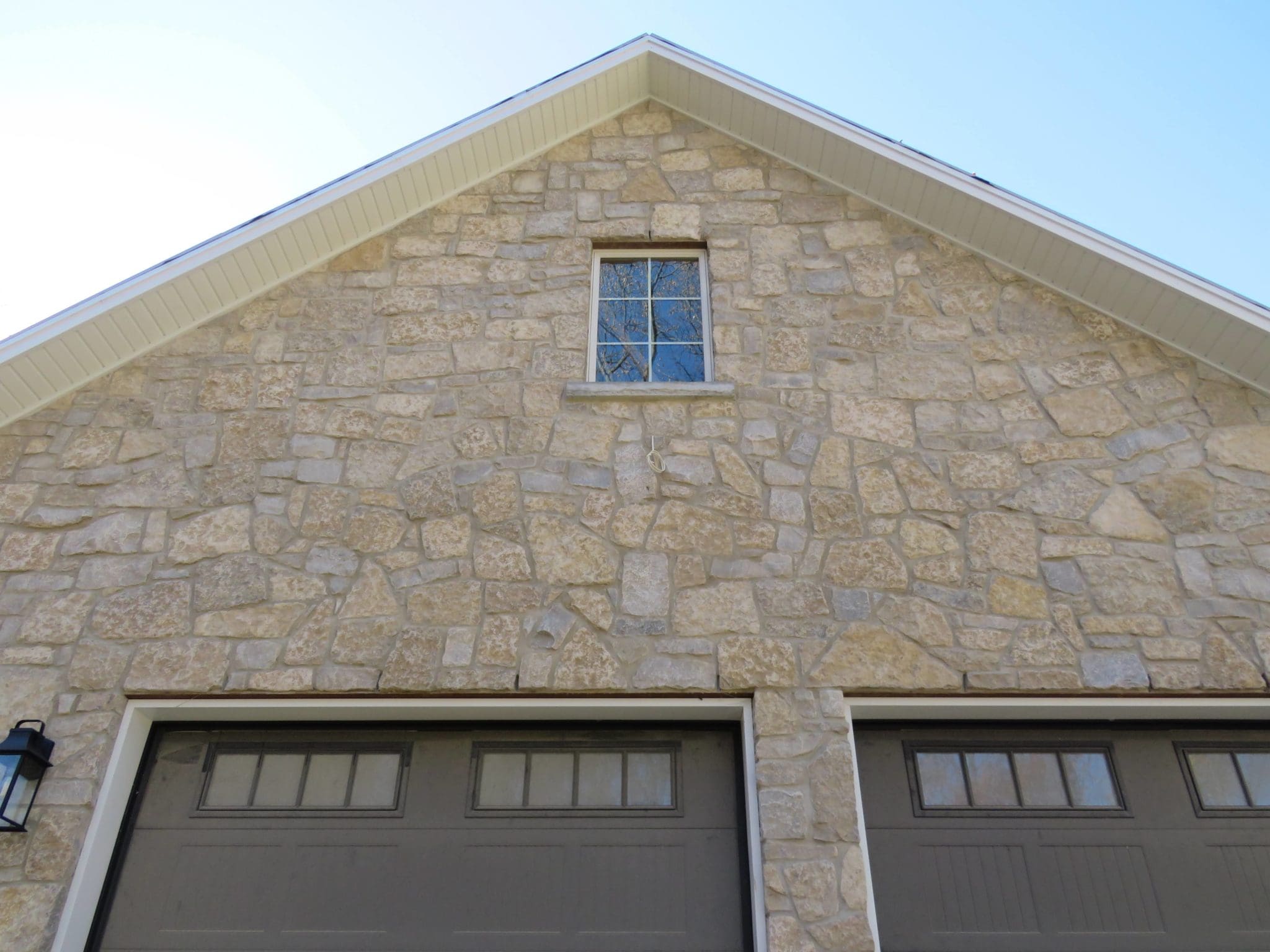 Chateau Natural Thin Stone Veneer Garage Close Up