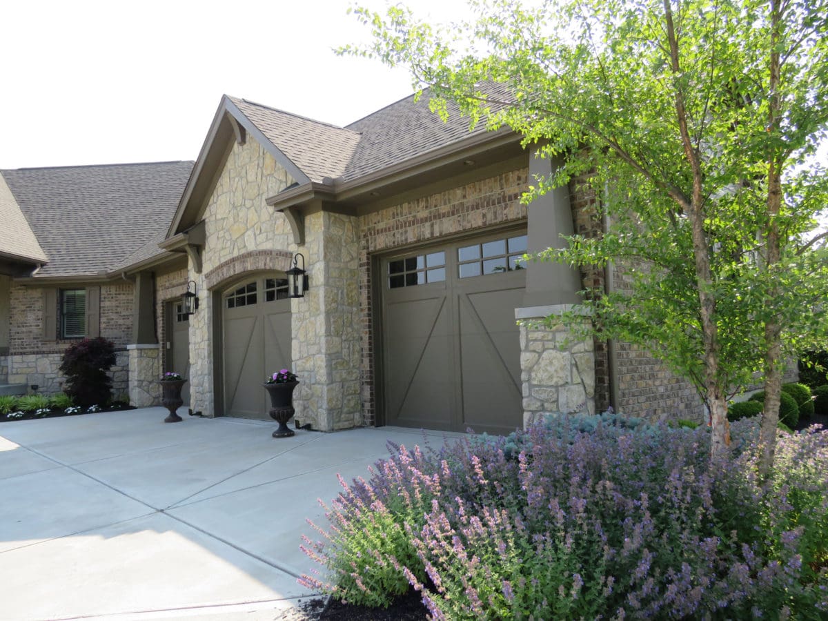 Chateau Real Stone Veneer Exterior, Wainscoting, and Garage | Quarry Mill