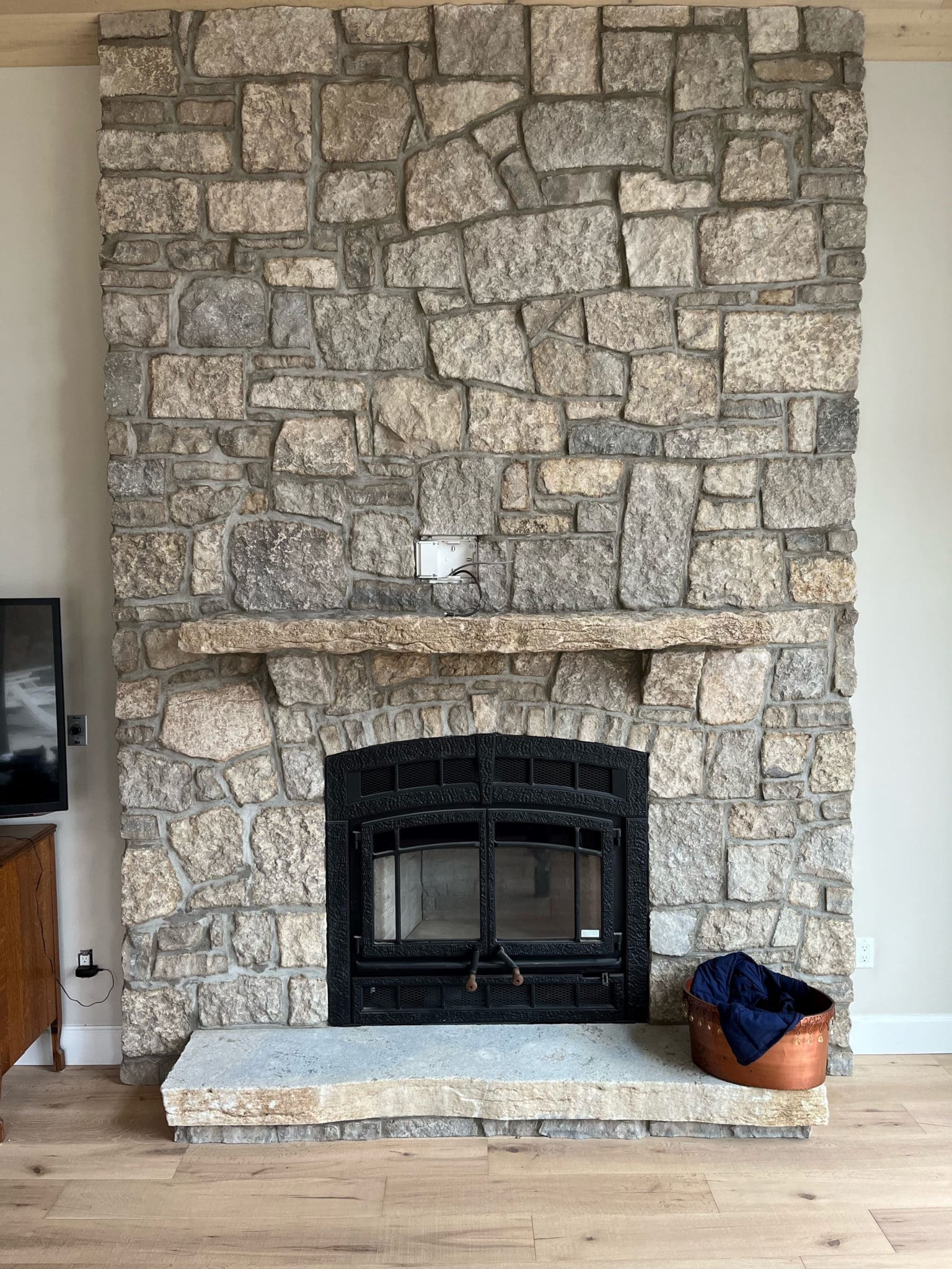 Chateau Real Tumbled Thin Stone Veneer Fireplace