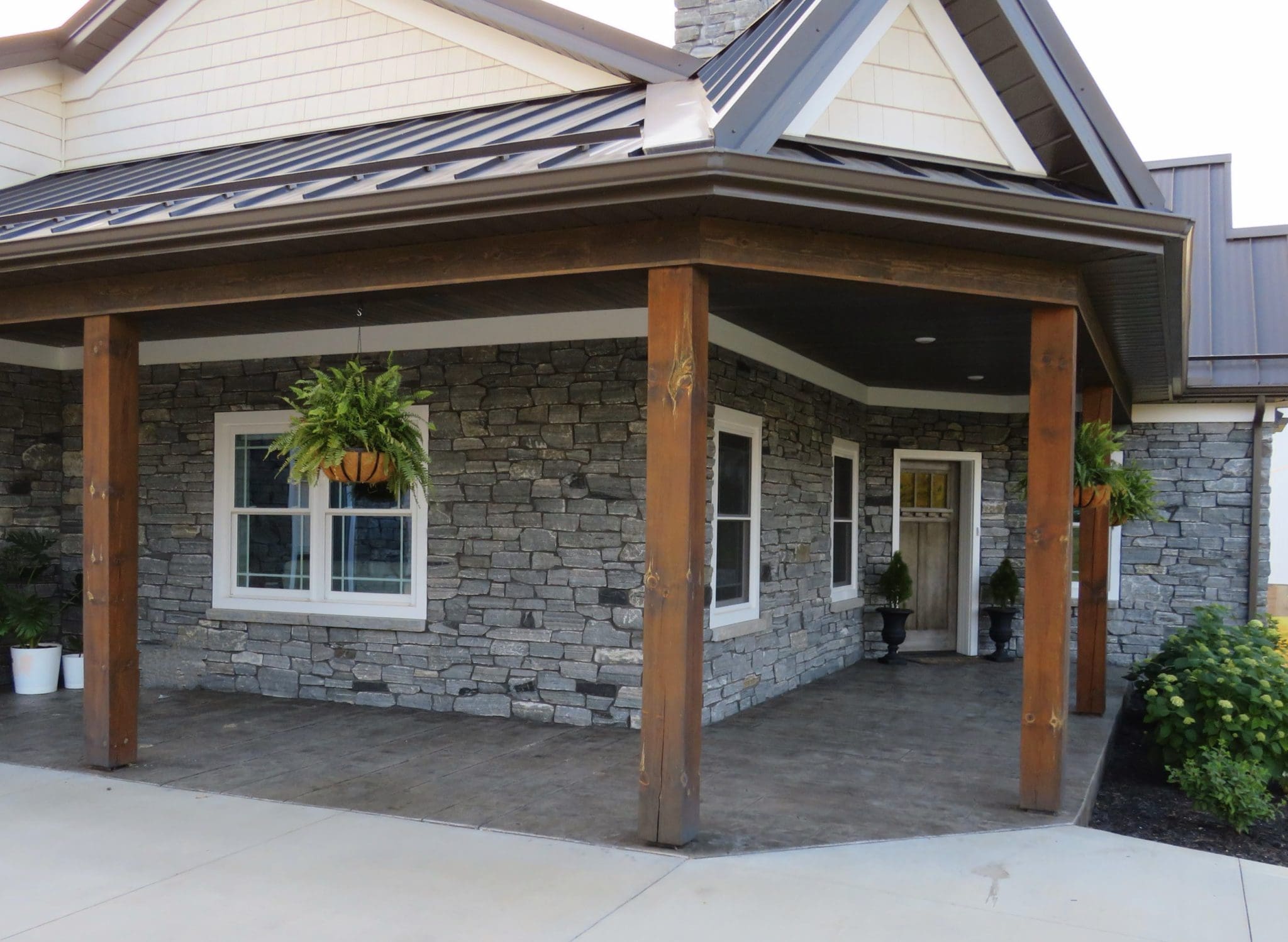 Logan Real Thin Stone Veneer Custom Splitface Exterior with Dark Mortar