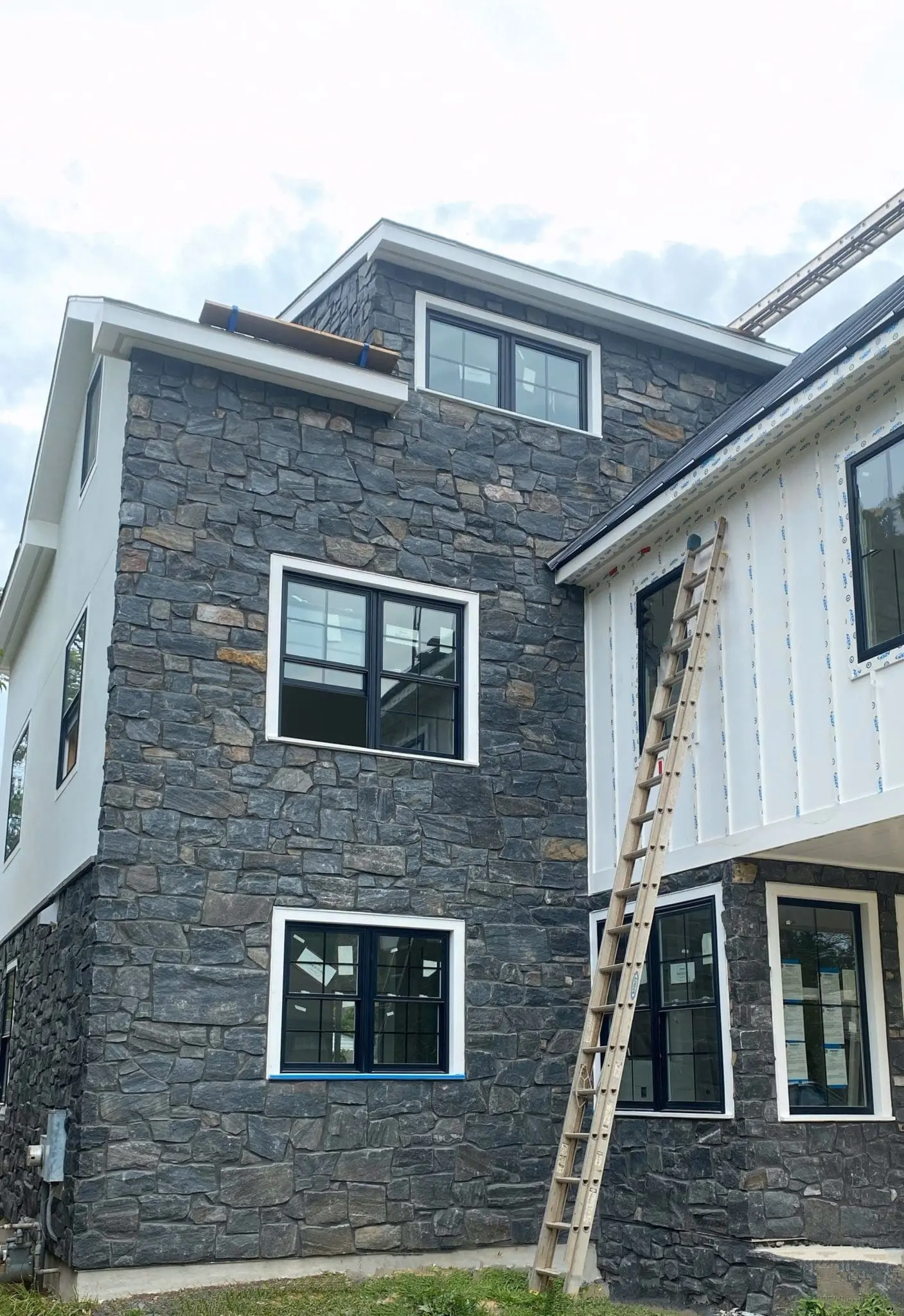 Monroe Real Thin Stone Veneer Custom Dark Exterior with Black Mortar