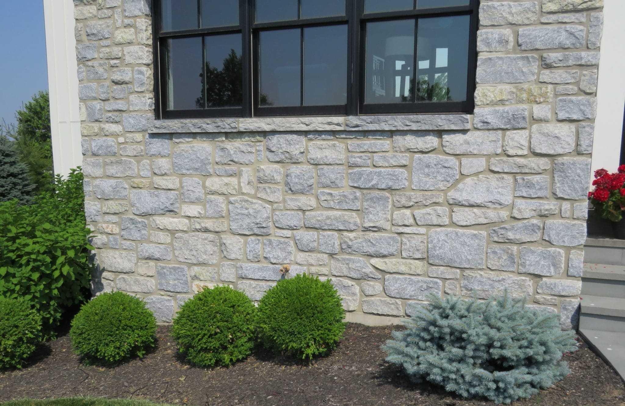 Nottingham Custom Linear Natural Tumbled Thin Stone Veneer Exterior