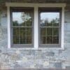 Augusta and Bayside Custom Blend Natural Stone Veneer Covered Patio