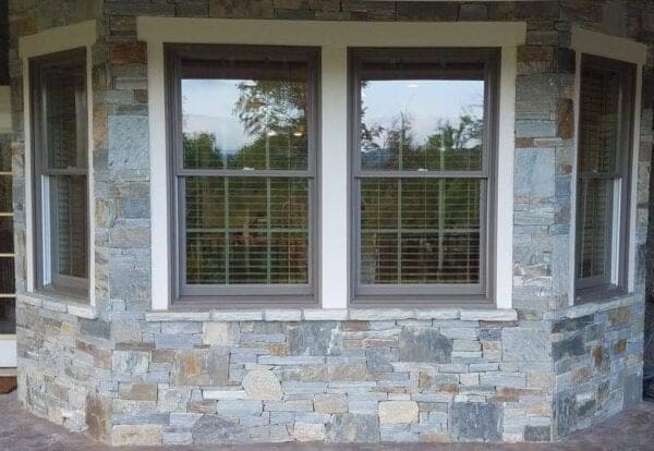 Augusta and Bayside Custom Blend Natural Stone Veneer Covered Patio