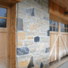 Baileys Harbor, Castle Ridge, and Concord Natural Stone Veneer Blend Rustic Exterior