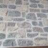 Duluth and Chateau Real Thin Stone Veneer Blend Fireplace Close Up with White Mortar