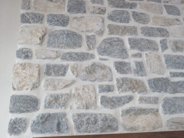 Duluth and Chateau Real Thin Stone Veneer Blend Fireplace Close Up with White Mortar