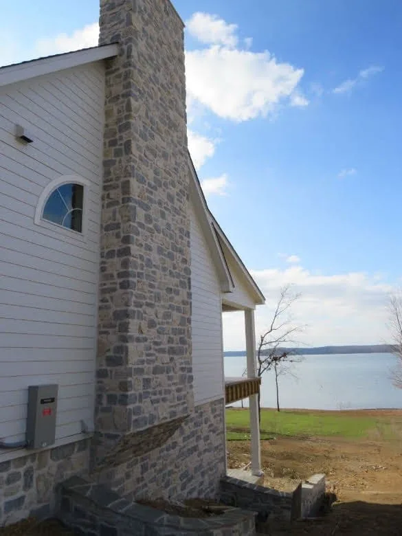 Duluth and Chateau Real Thin Stone Veneer Blend Lake House with White Mortar