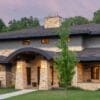 Vienna Real Stone Veneer Exterior with Custom Mineral Stained Pieces