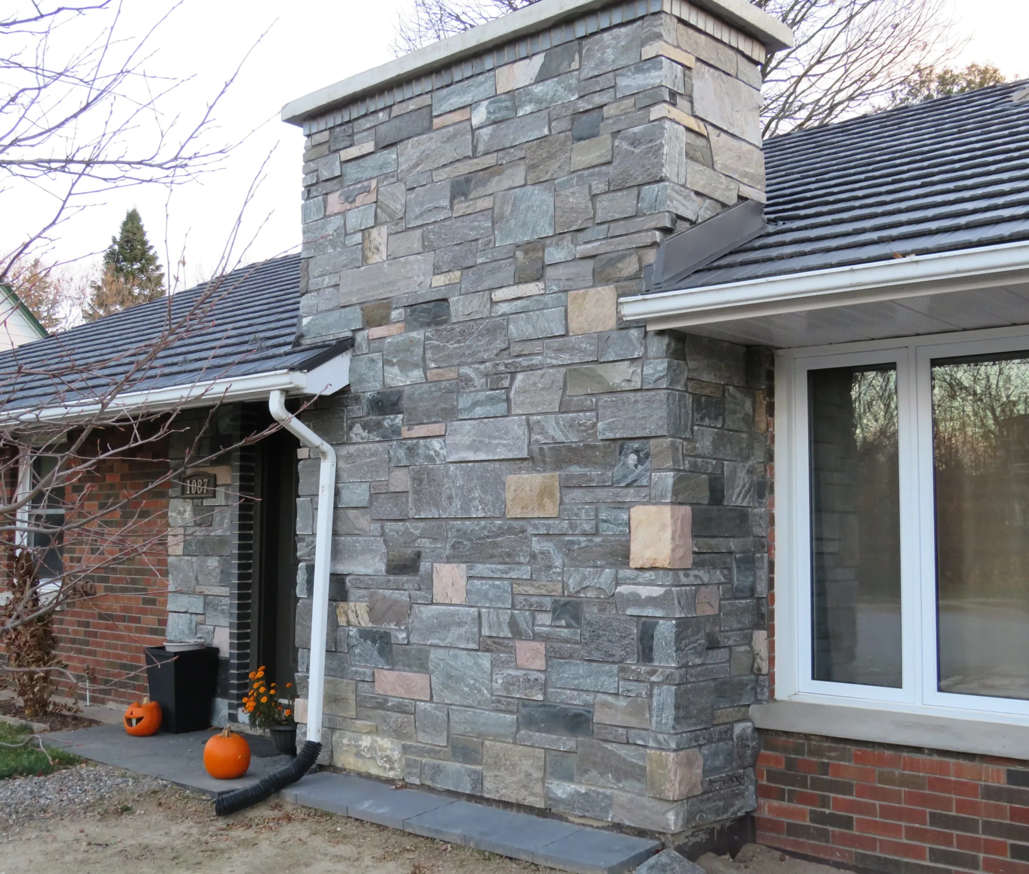 Custom Astoria Real Stone Veneer with Sawn Heights Exterior and Custom Color (Less Pink)