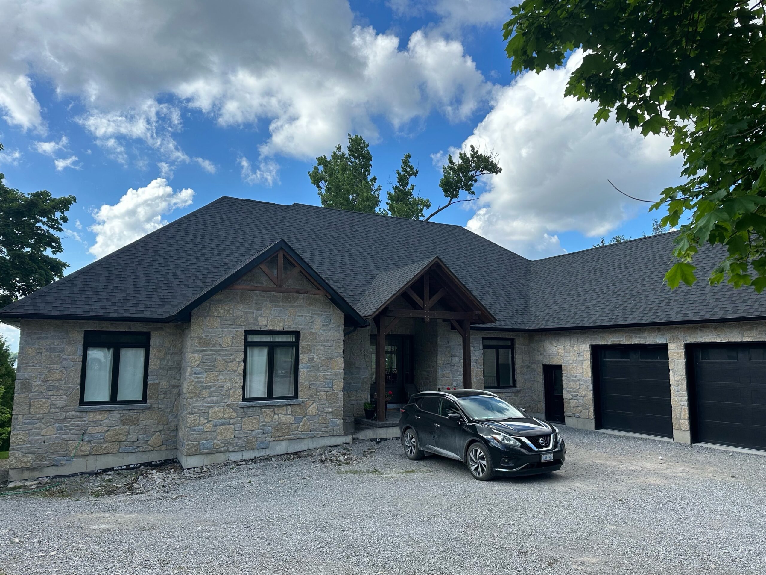 Chateau Natural Thin Stone Veneer Lake House Front Install