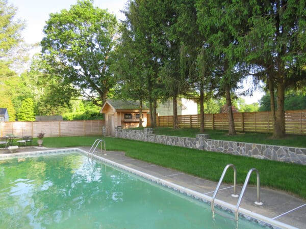 Custom Blend Concord and Custom Mosaic Dublin Real Stone Veneer Pool Landscape Wall