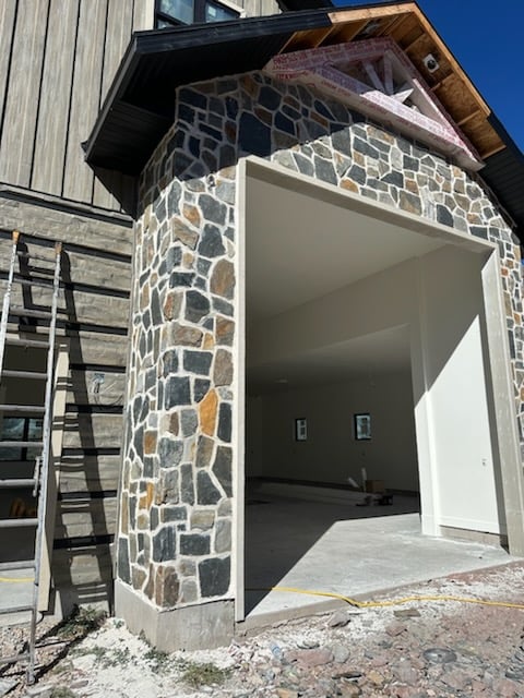 Newport Natural Thin Stone Veneer Garage with White Mortar