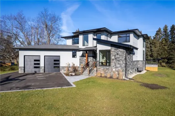Custom Dublin and Pembroke Drystack Cut Real Stone Veneer Exterior