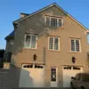 Larchmont Custom Course Height Natural Stone Veneer Garage