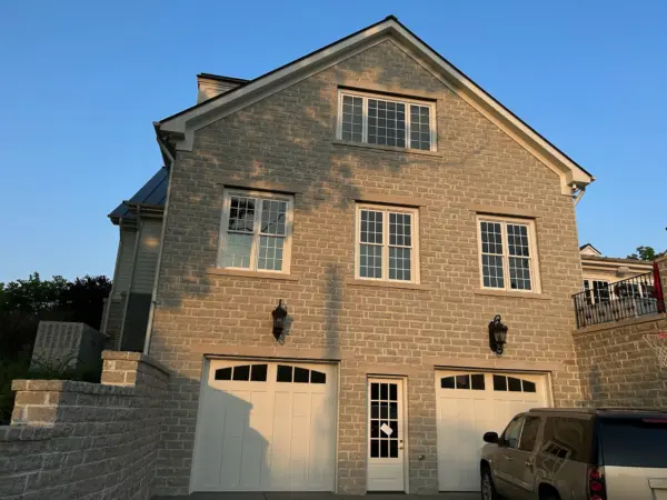 Larchmont Custom Course Height Natural Stone Veneer Garage