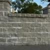 Larchmont Custom Course Height Natural Stone Veneer Privacy Wall
