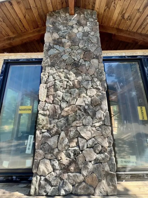 Moss Rock Real Thin Stone Veneer Drystack Chimney Installation