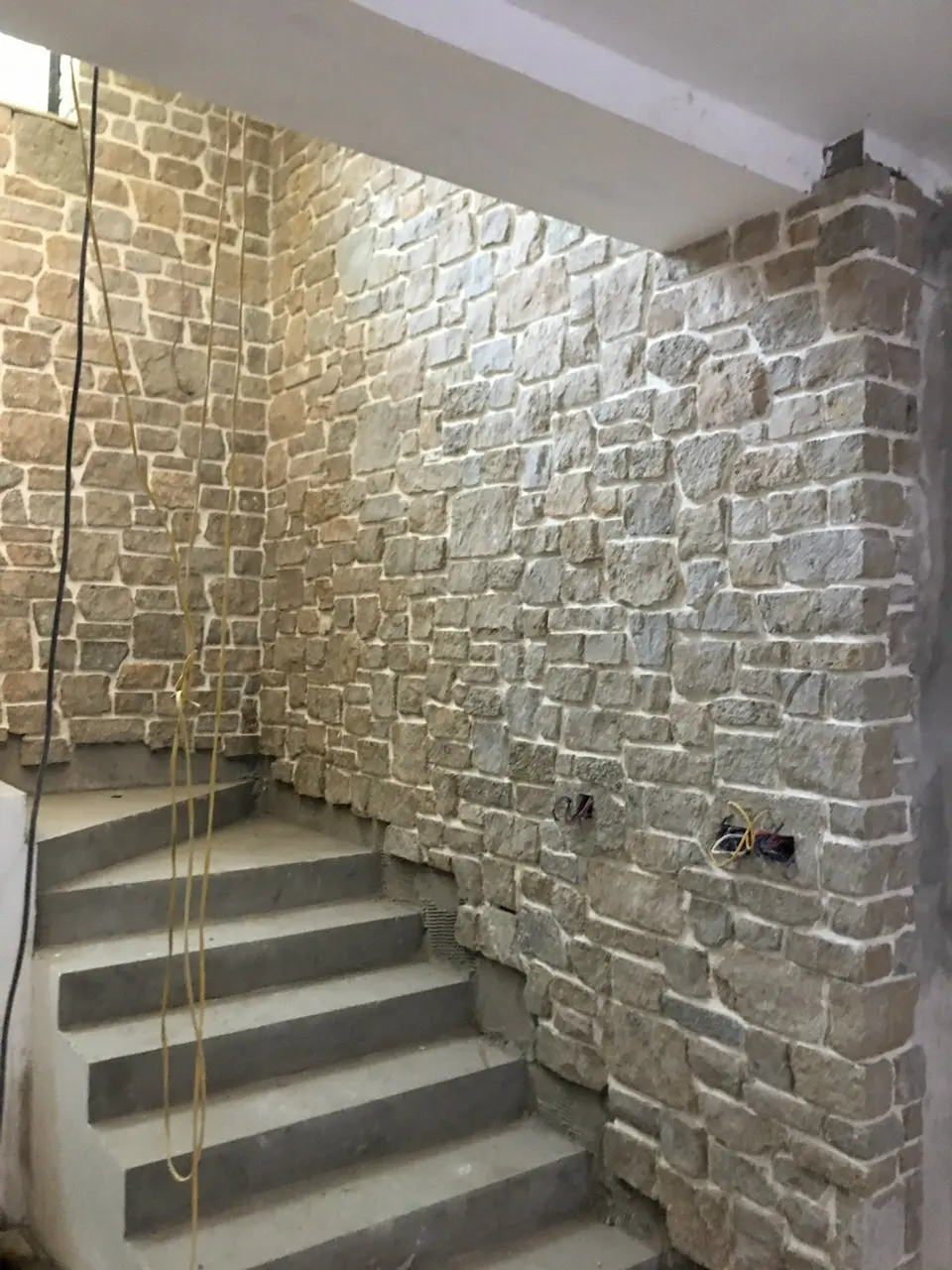 Tuscan Antique Natural Thin Stone Veneer Interior Stairwell Install