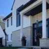 Alpine and Snowcap Natural Stone Veneer Blend Front Entrance