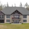 Chateau Natural Thin Stone Veneer Lake House Day