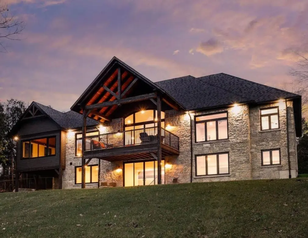 Chateau Natural Thin Stone Veneer Lake House Exterior