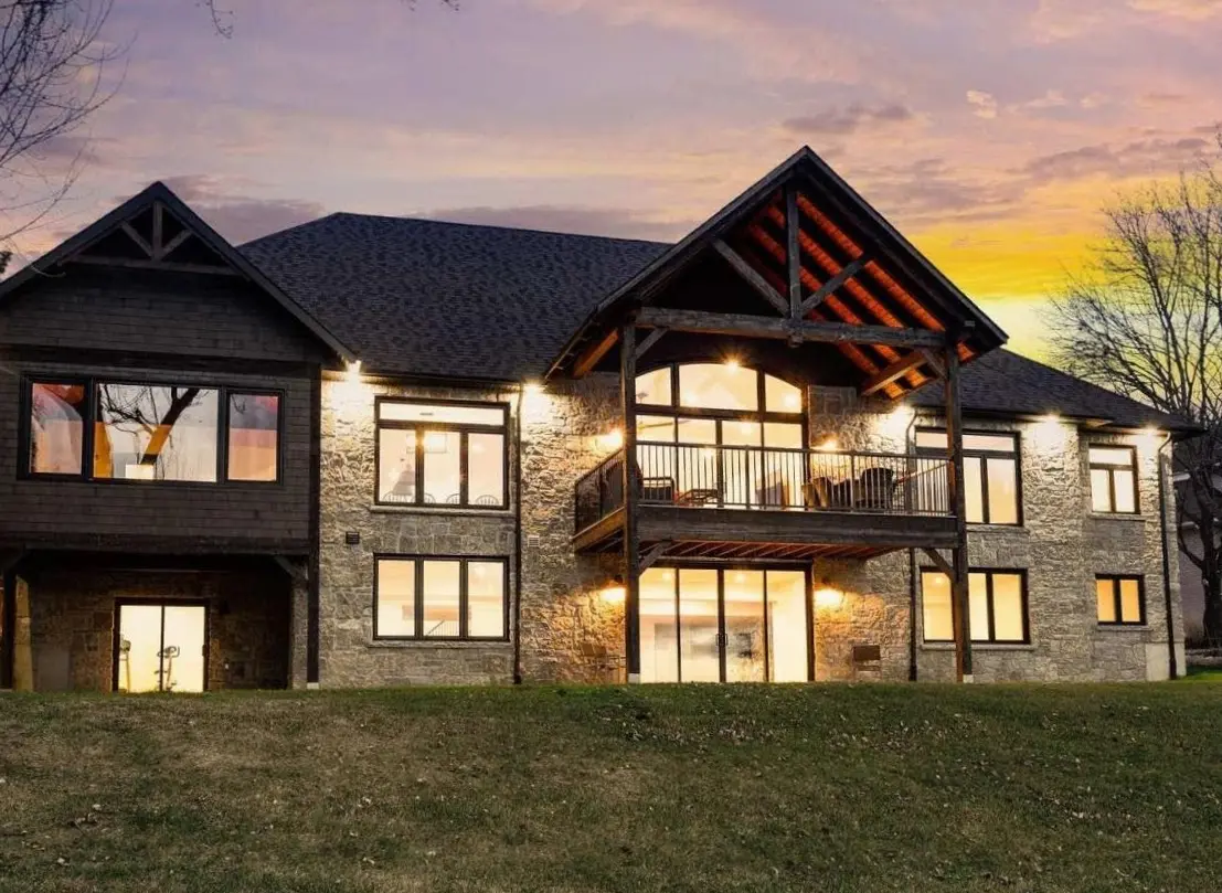 Chateau Real Thin Stone Veneer Lake House Exterior
