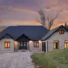Chateau Real Thin Stone Veneer Lake House Front View