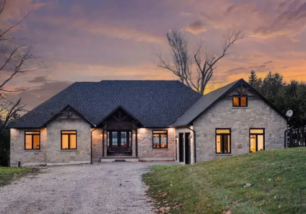 Chateau Real Thin Stone Veneer Lake House Front View