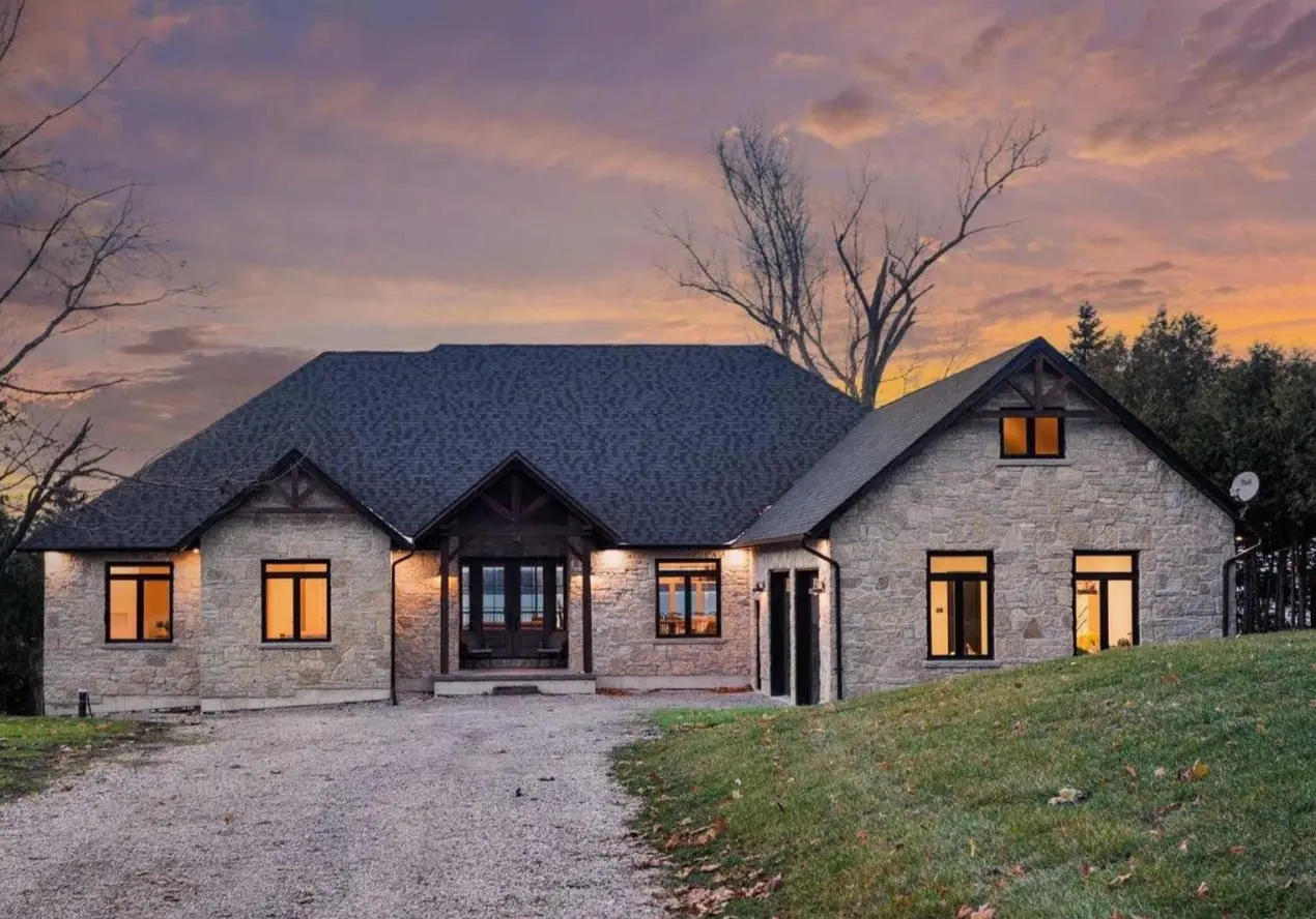 Chateau Real Thin Stone Veneer Lake House Front View