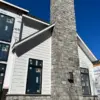 Custom Gallatin Natural Thin Stone Veneer Chimney and Wainscoting Installation