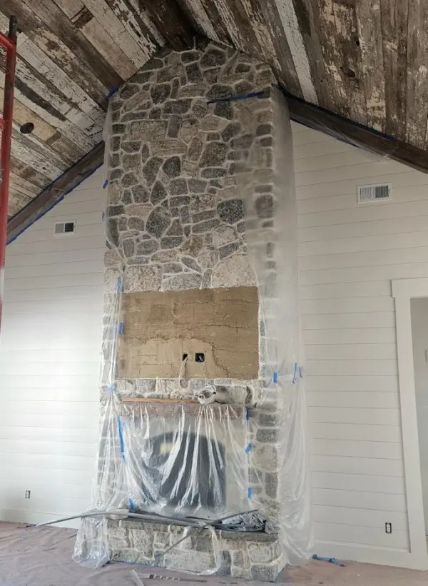 Door County Fieldstone and Nottingham Natural Stone Veneer Fireplace White Mortar