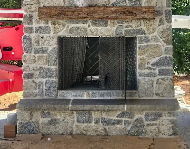Door County Fieldstone and Nottingham Real Stone Veneer Fireplace Close Up White Mortar
