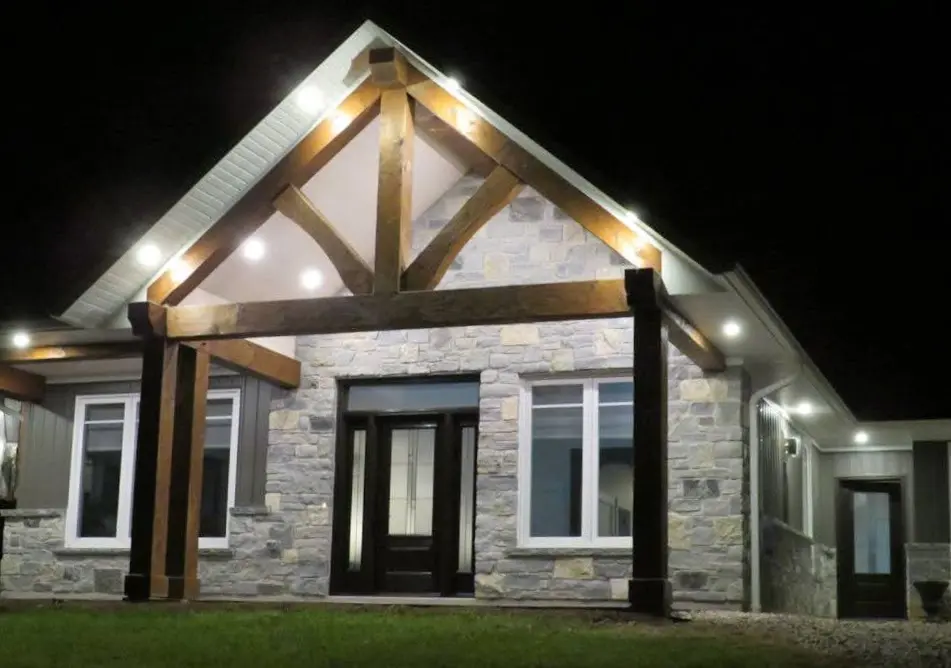 Larchmont, Monroe and Castle Ridge Real Stone Veneer Blend Night Exterior