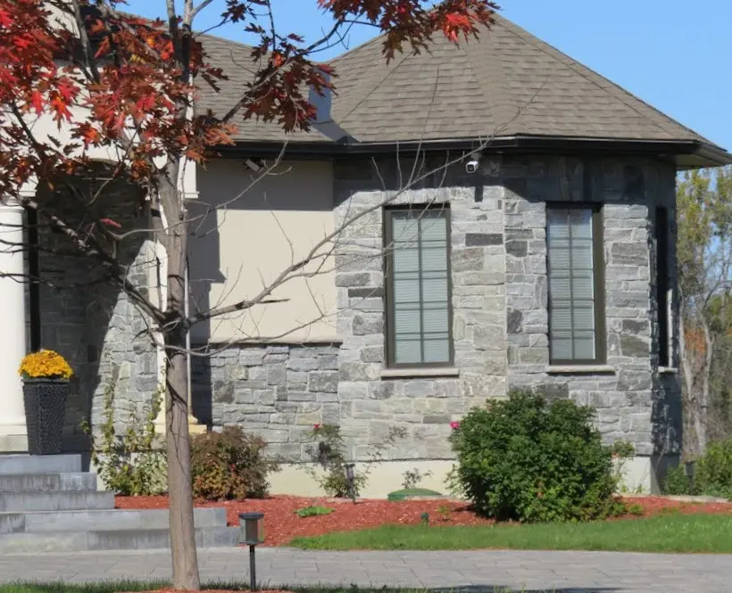 Logan Real Thin Stone Veneer Turret Exterior